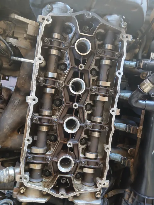 An open cylinder head showing the camshafts